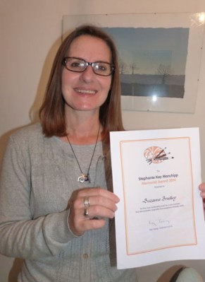 suzanne bradley receiving her award