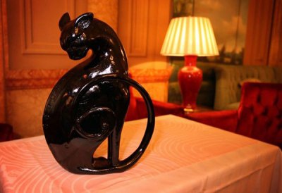 black cat wood statue named Kaspar
